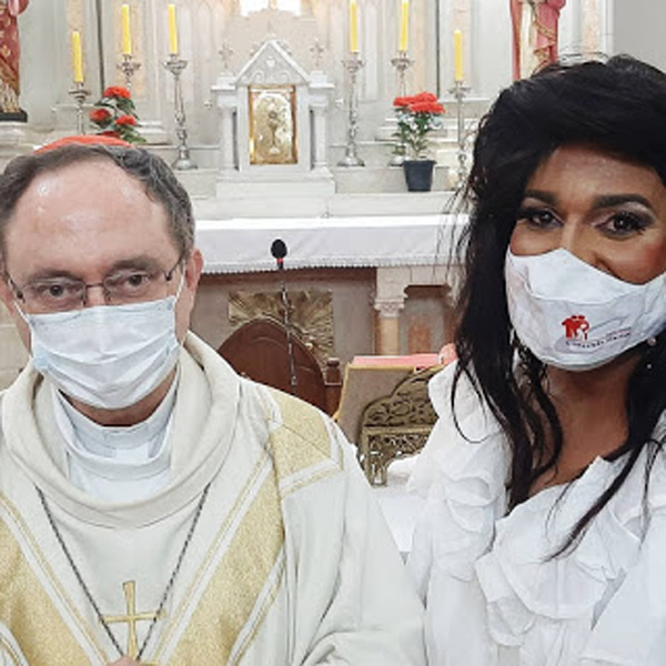 Cardinal Sergio Rocha poses with Drag Queen